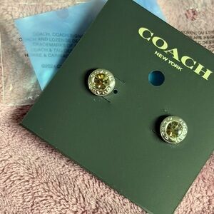 Coach Gold-Tone Logo Stud Earrings with Iridescent Crystal Center
